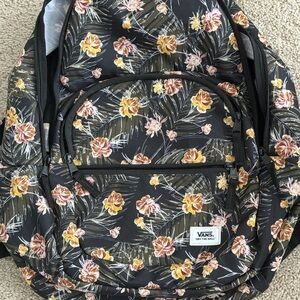 Vans Ranged backpack with a black and multi-color floral design like new!